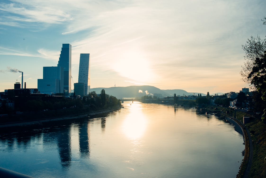 Basel's modern skyline along the Rhine River, site of the Port of Switzerland solar energy strategy